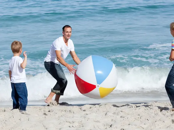 Family participating  in Rethymno Beach part of Filiko Tours Beach Games Activity
