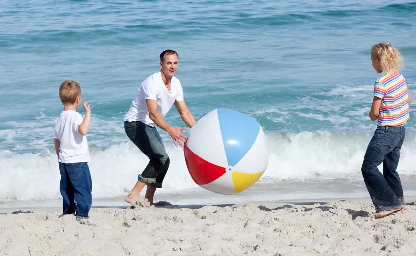 Family participating  in Rethymno Beach part of Filiko Tours Beach Games Activity