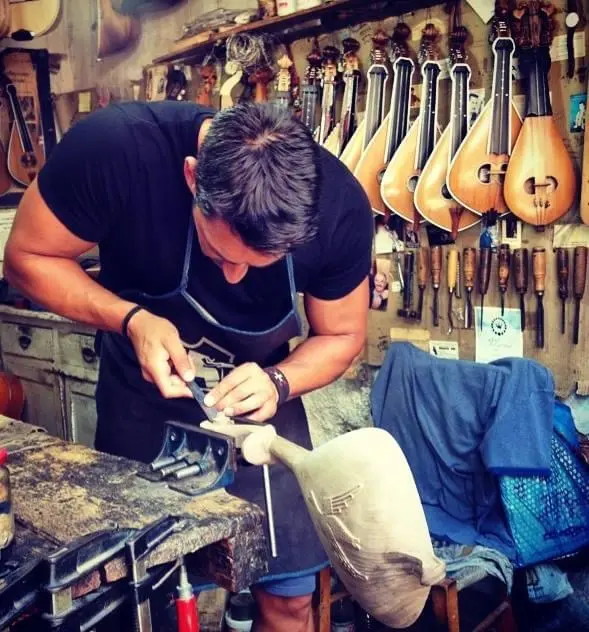 traditional Cretan lyra craftsman from arts and crafts filiko tours